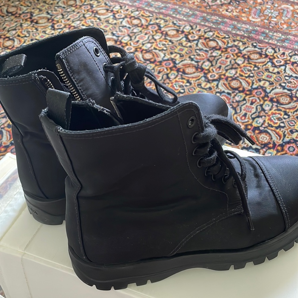 Prada black boots. Never worn. Brand new.